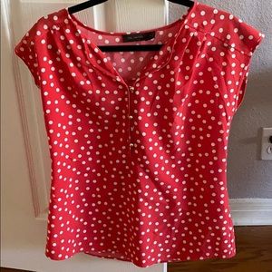 The limited polka dot blouse